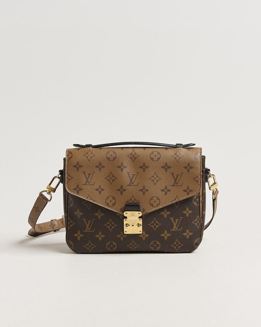 Louis Vuitton Pre-Owned Pochette Métis Reverse Monogram – Marrón