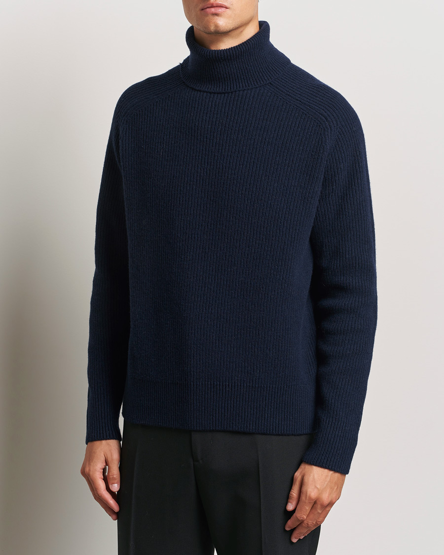 Hombres |  | BOSS BLACK | Evento Wool Rib Knitted Polo Dark Blue