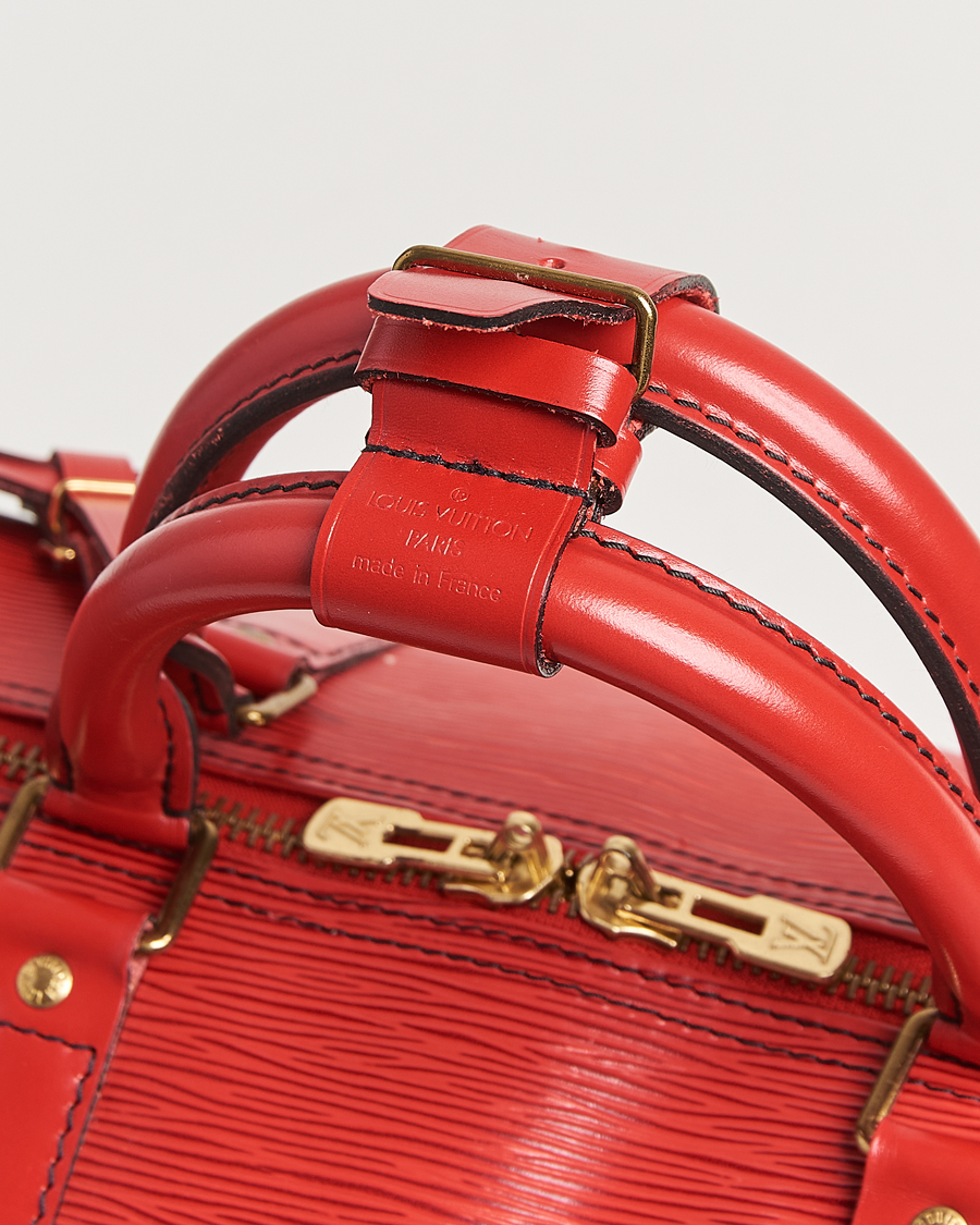 Hombres | Louis Vuitton Pre-Owned Keepall 50 Epi Leather Bag Red | Louis Vuitton Pre-Owned | Keepall 50 Epi Leather Bag Red